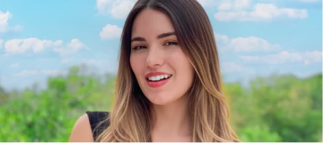 Happy veneers patient smiling confidently after a successful cosmetic dentistry treatment.
