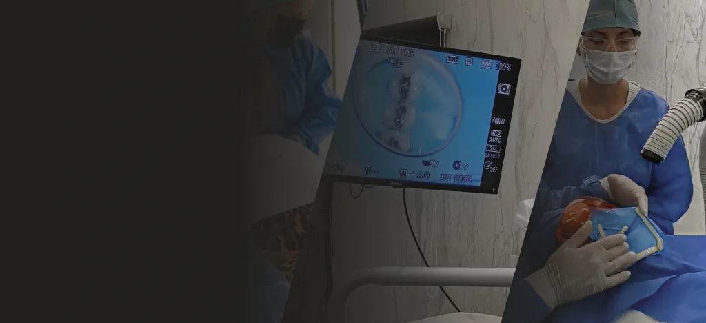 Root canal treatment in progress with digital X-ray displayed on a monitor at SmileMakeover Playa del Carmen Dental.