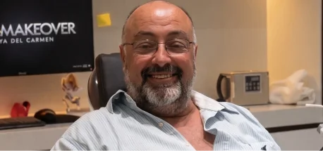 Happy patient sharing their Smile Makeover experience after dental crowns treatment.