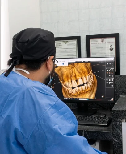 Cosmetic dentist analyzing digital smile design for veneer treatment planning.