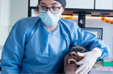 Dental team performing advanced implant treatment in a modern clinic