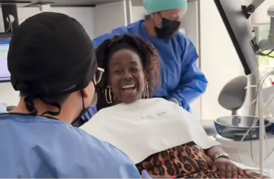 Patient relaxing during a comfortable dental implant procedure.